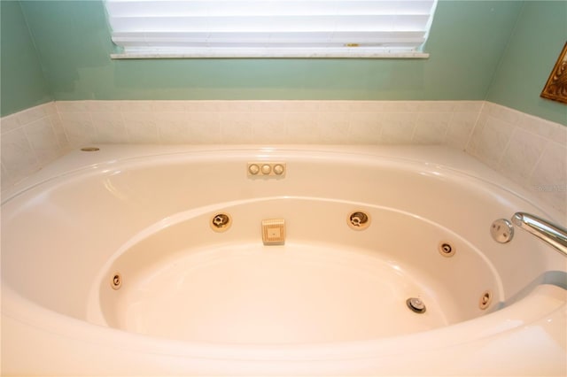 bathroom with a tub