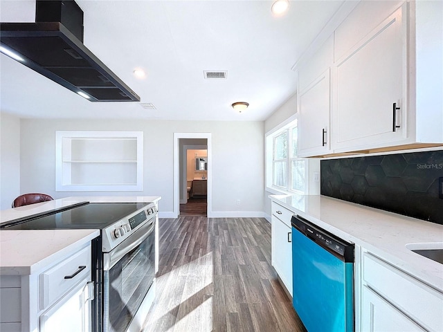 kitchen with decorative backsplash, light stone counters, white cabinetry, and appliances with stainless steel finishes