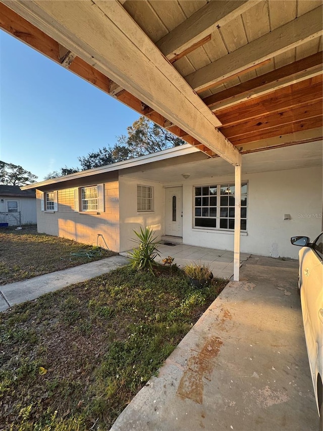 view of front of property featuring a patio