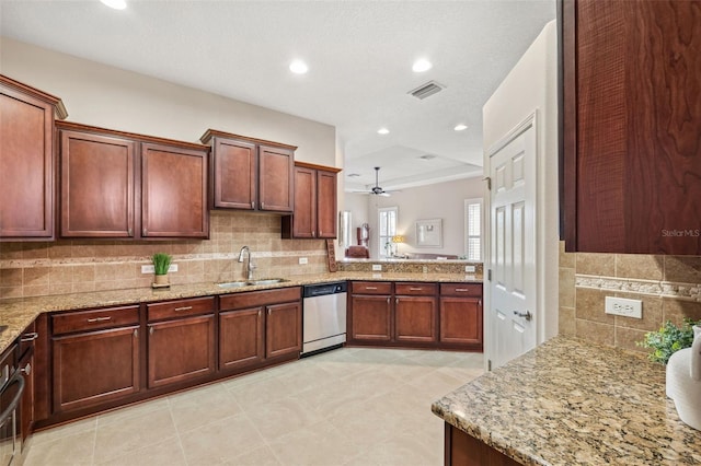 kitchen featuring kitchen peninsula, ceiling fan, dishwasher, and sink