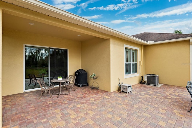 view of patio featuring central air condition unit