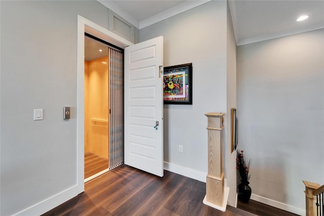 bedroom with dark wood-type flooring and crown molding