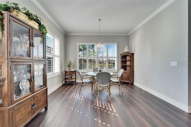 1308 Alhambra Dr, Apollo Beach, FL 33572 - dining area featuring dark wood-type flooring, a chandelier, and ornamental molding