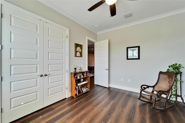 1308 Alhambra Dr, Apollo Beach, FL 33572 - living area with ceiling fan, dark wood finished floors, and crown molding