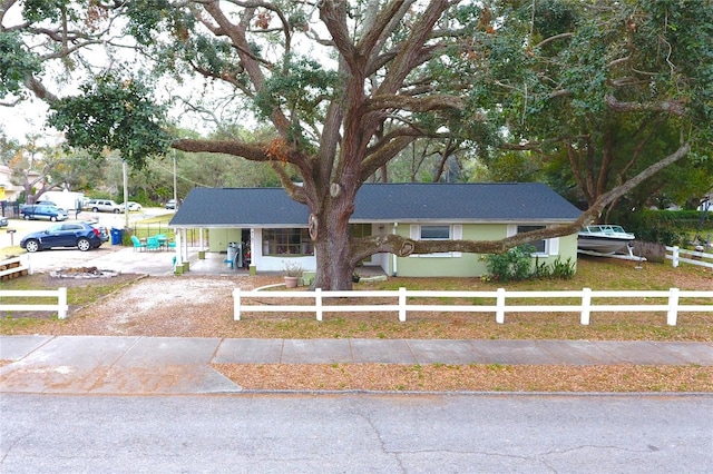 ranch-style house featuring a porch