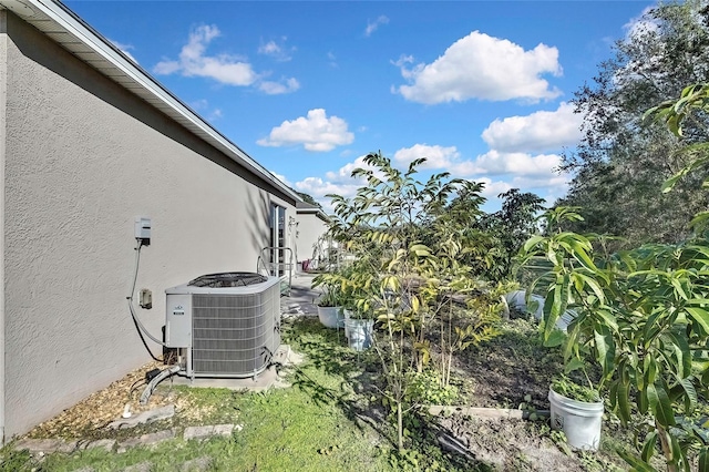 view of yard featuring central AC