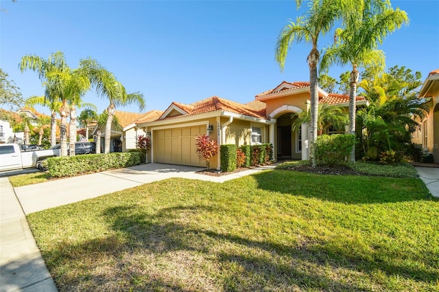 mediterranean / spanish-style house with a garage and a front lawn