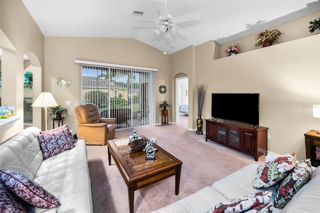 carpeted living room featuring ceiling fan and lofted ceiling