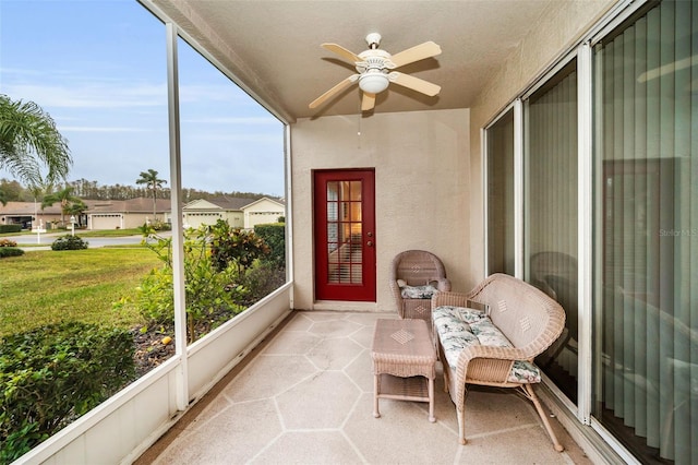 sunroom / solarium with ceiling fan