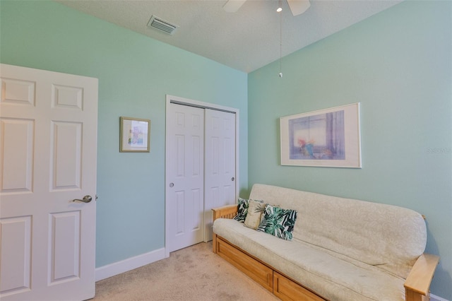 6516 Salt Creek Ave, Apollo Beach, FL 33572 - sitting room featuring light carpet, baseboards, and a ceiling fan