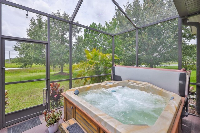 6516 Salt Creek Ave, Apollo Beach, FL 33572 - sunroom / solarium featuring a jacuzzi