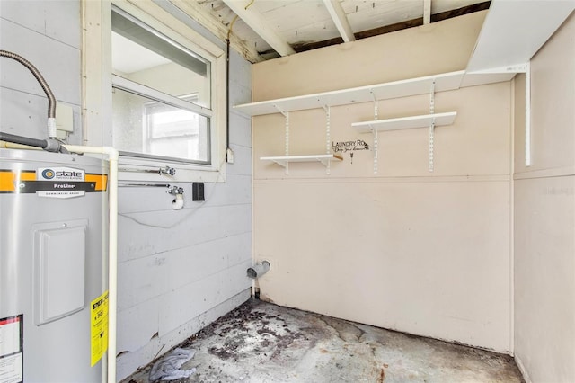 laundry area featuring electric water heater