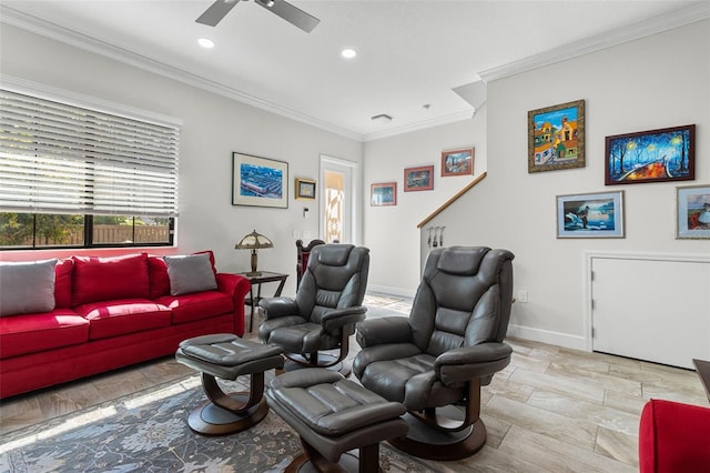 living room featuring ceiling fan and crown molding