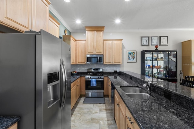 kitchen featuring light brown cabinets, crown molding, sink, dark stone countertops, and stainless steel appliances