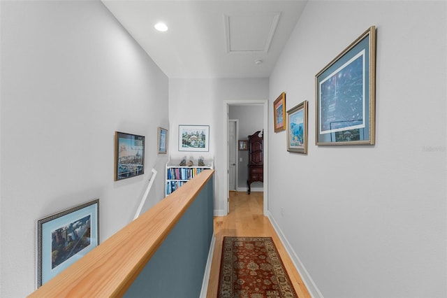 hall with light hardwood / wood-style floors