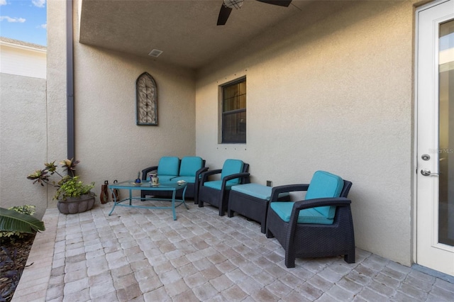 view of patio / terrace featuring ceiling fan and an outdoor hangout area