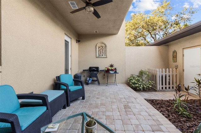 view of patio with ceiling fan