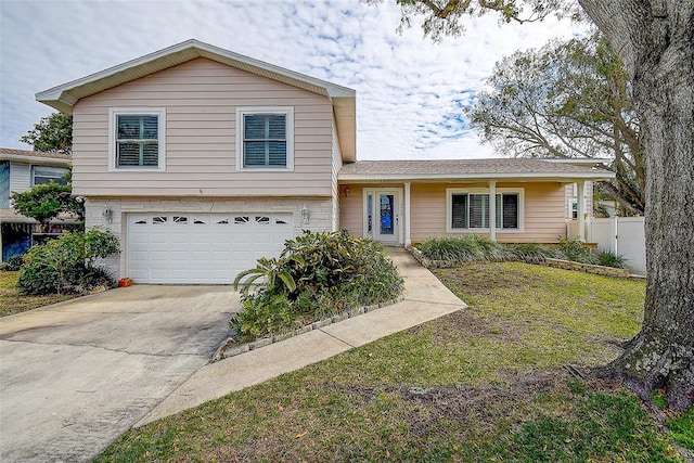 split level home featuring a garage