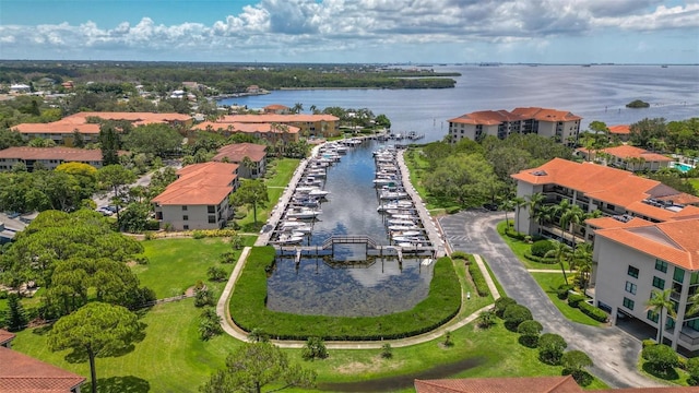 birds eye view of property featuring a water view