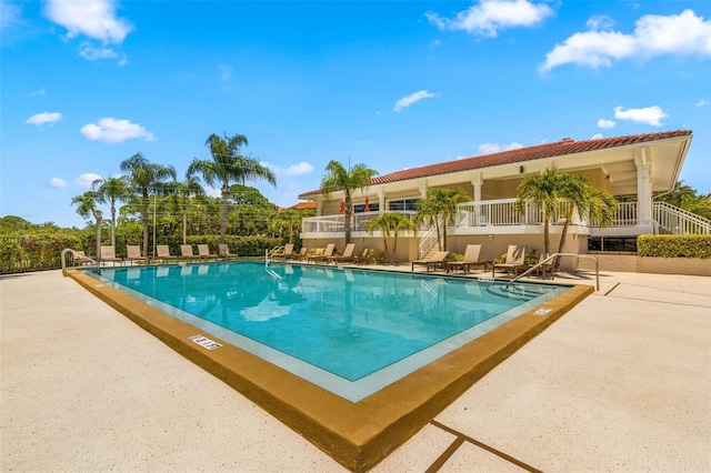 view of swimming pool featuring a patio