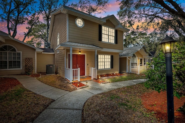 view of front property with cooling unit