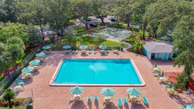 view of swimming pool with a patio area