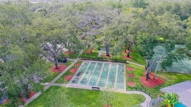 view of pool with a yard