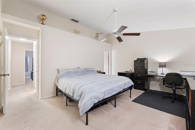 bedroom featuring light carpet and ceiling fan