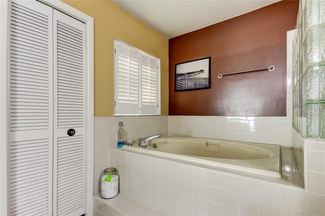 bathroom with tiled tub