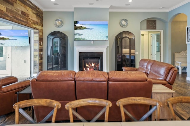 living room featuring ornamental molding and hardwood / wood-style floors