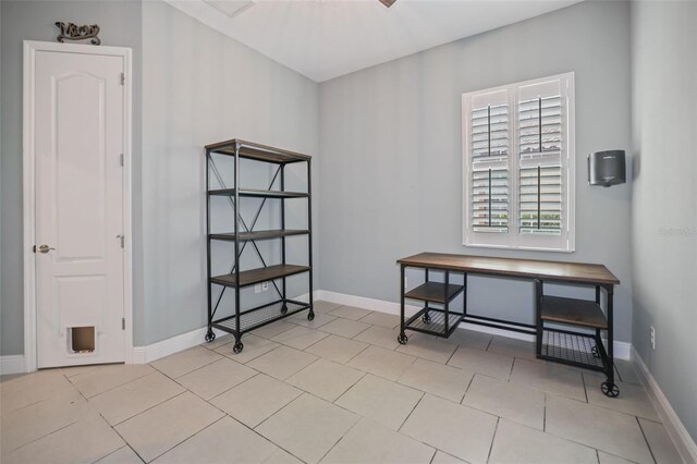 misc room featuring light tile patterned floors