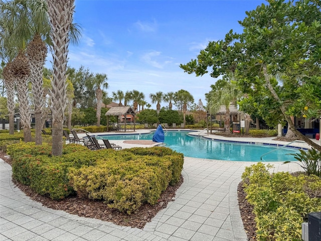 view of swimming pool featuring a gazebo and a patio