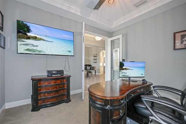 carpeted office space with ceiling fan and crown molding