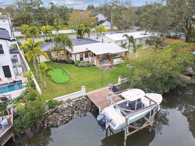 birds eye view of property with a water view