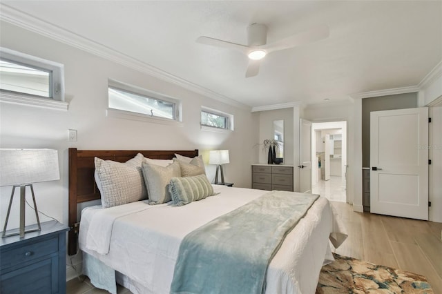 bedroom with ceiling fan, light wood-type flooring, and crown molding