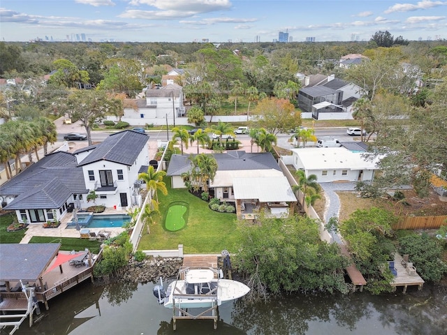 bird's eye view with a water view