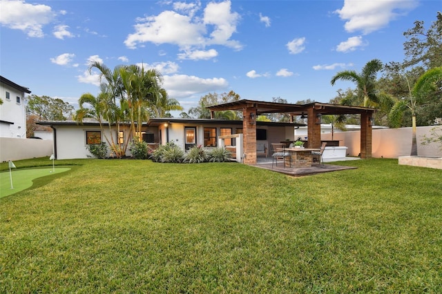 rear view of house with a patio