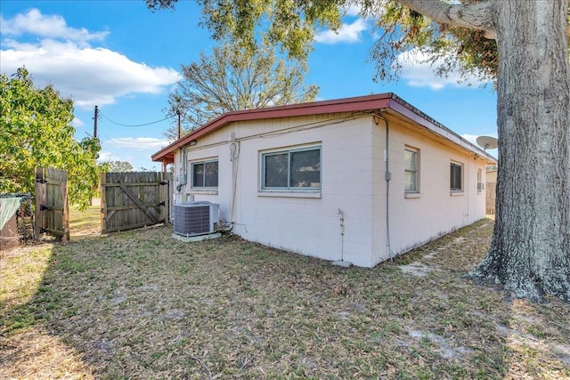 view of home's exterior featuring central AC unit