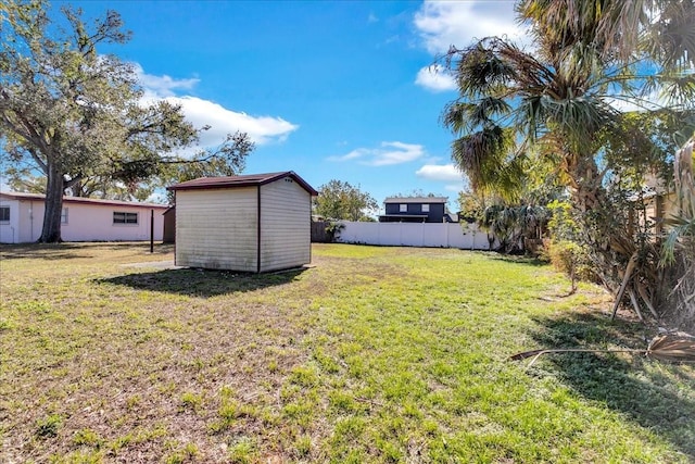 view of yard with a storage shed