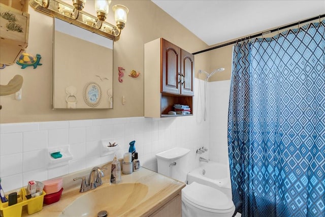 full bathroom with toilet, vanity, tile walls, and shower / tub combo with curtain