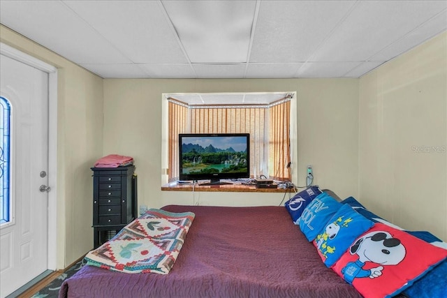 bedroom featuring a paneled ceiling