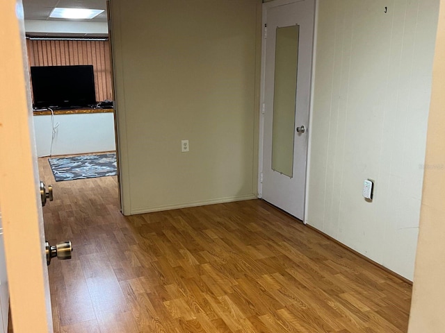 empty room featuring hardwood / wood-style floors