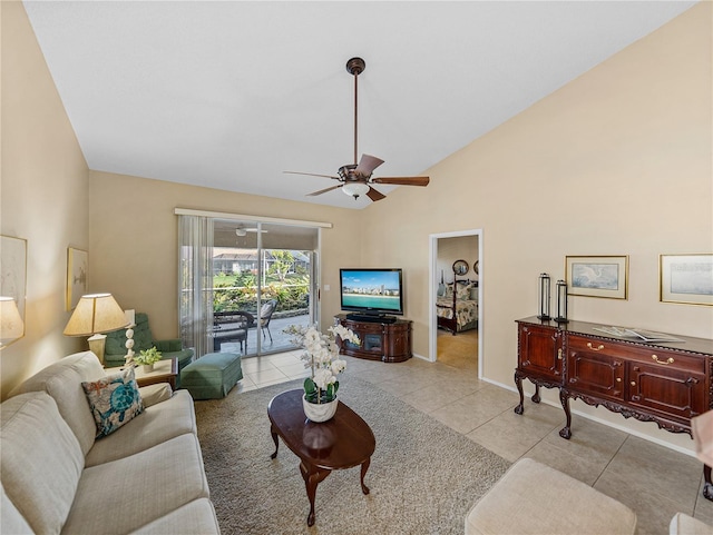 tiled living room featuring ceiling fan and lofted ceiling