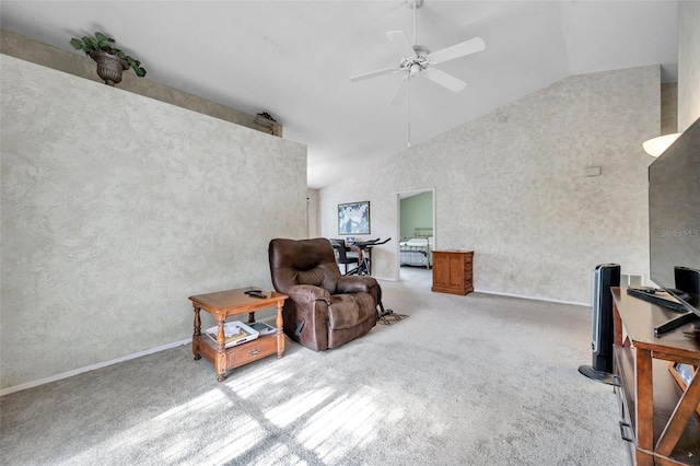 living room featuring carpet floors, high vaulted ceiling, and ceiling fan