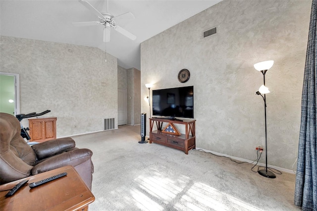 living room featuring light carpet, high vaulted ceiling, and ceiling fan