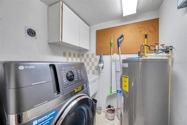 clothes washing area with water heater and cabinets