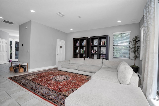 living room featuring light tile patterned floors