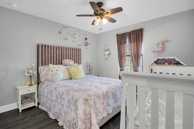 bedroom featuring ceiling fan and dark hardwood / wood-style flooring