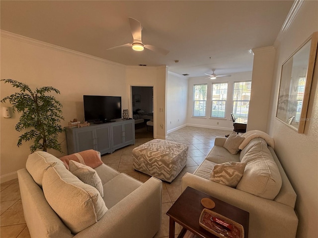 tiled living room with ceiling fan and ornamental molding