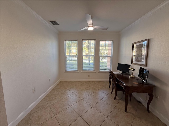 office space featuring ceiling fan, crown molding, and light tile patterned floors